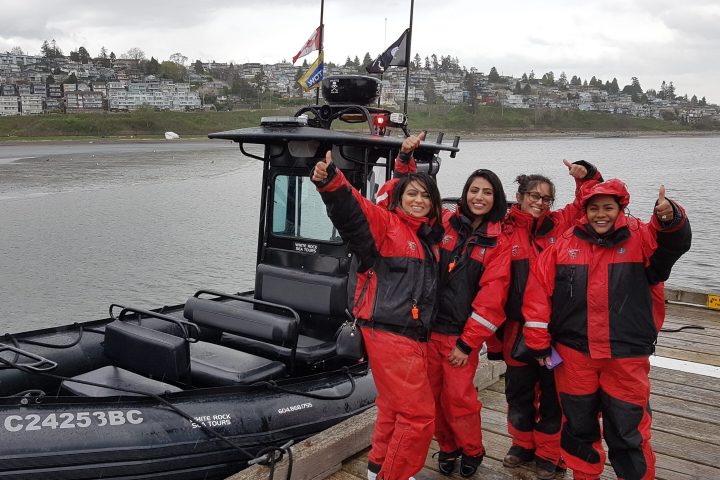 a person standing in front of a boat
