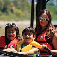 Family enjoying boat ride