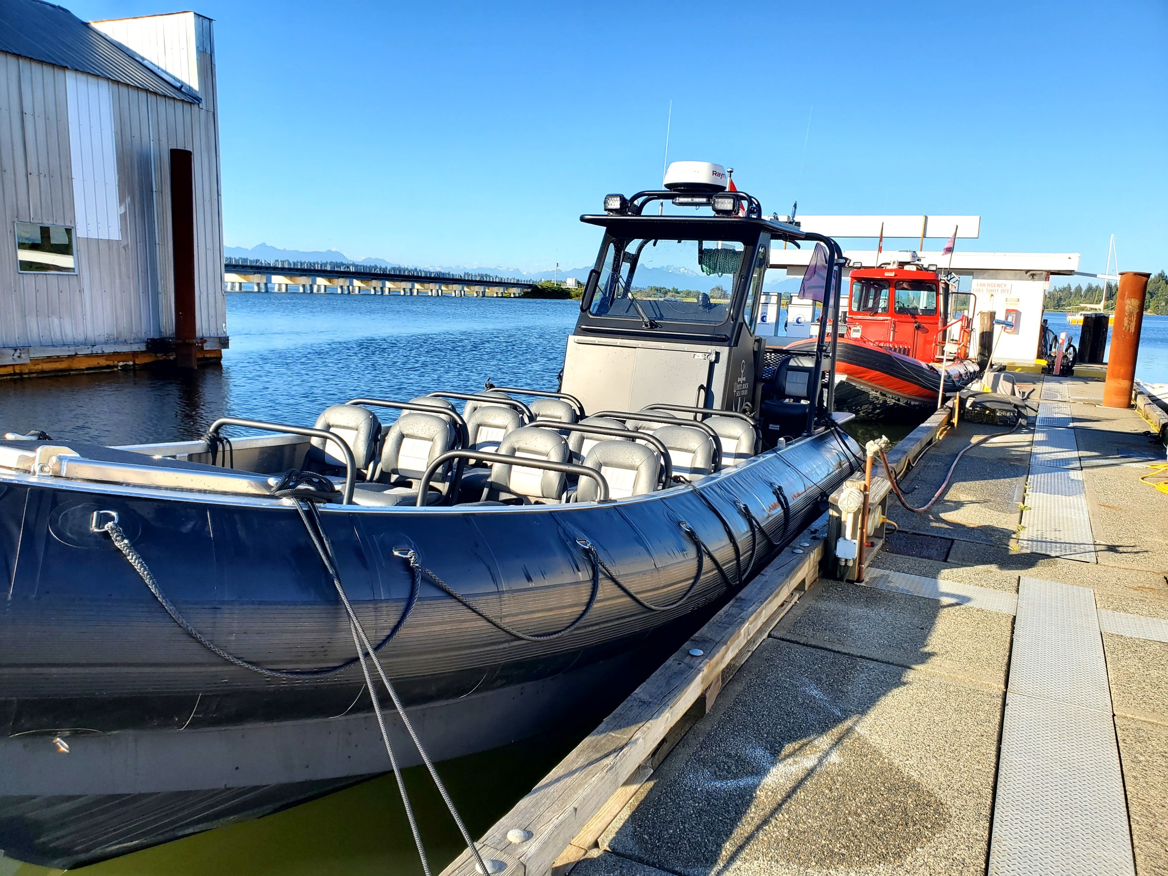 a boat sitting on top of a pier